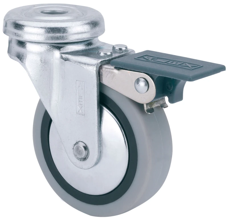 Rueda para muebles auxiliares decoración expositores agujero pasante con freno goma gris inyectada Alex