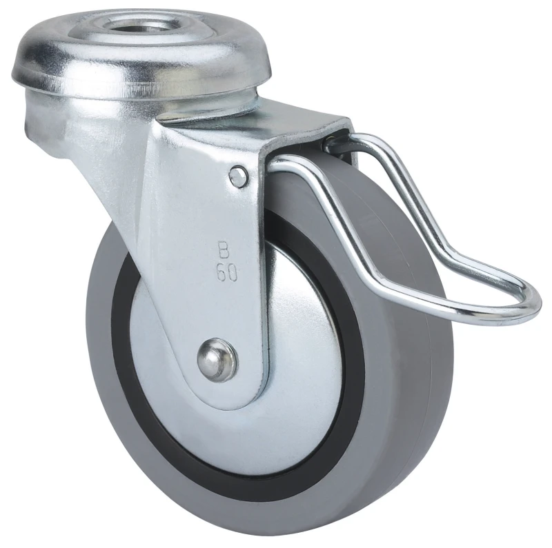 Rueda para muebles auxiliares decoración expositores agujero pasante con freno de hierro goma gris inyectada Alex